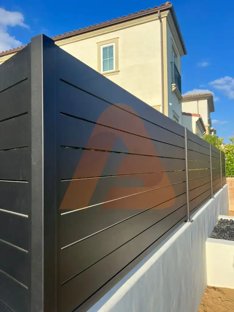 ALU 40 black slat fence installed by Aluglobus Aluminum Systems