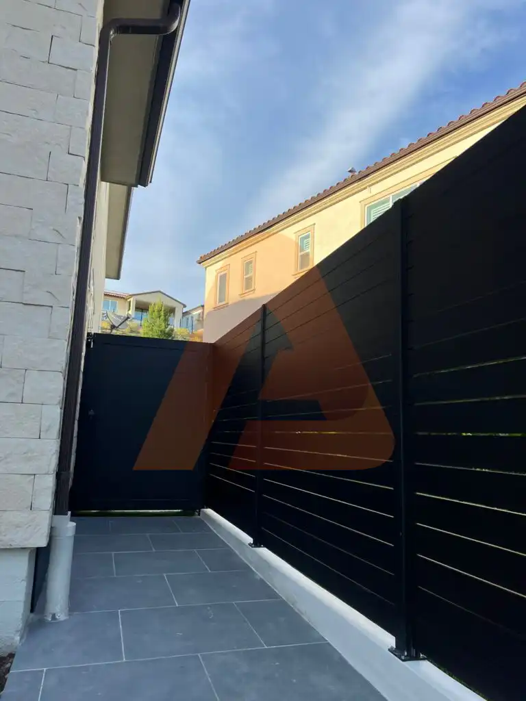 ALU 40 black slat fence installed by Aluglobus Aluminum Systems