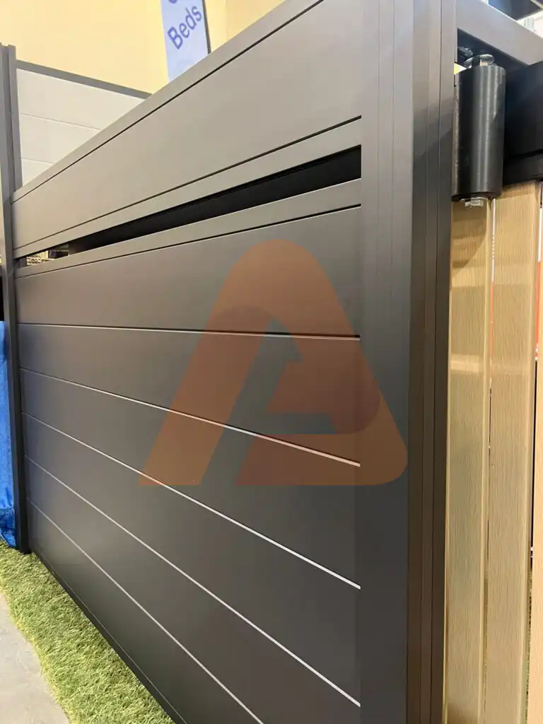 ALU 60 T&G black fence installed by Aluglobus Aluminum Systems
