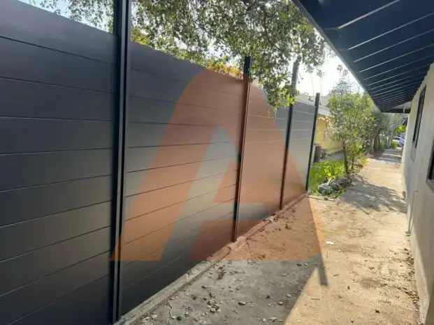 ALU 60 T&G black fence installed by Aluglobus Aluminum Systems