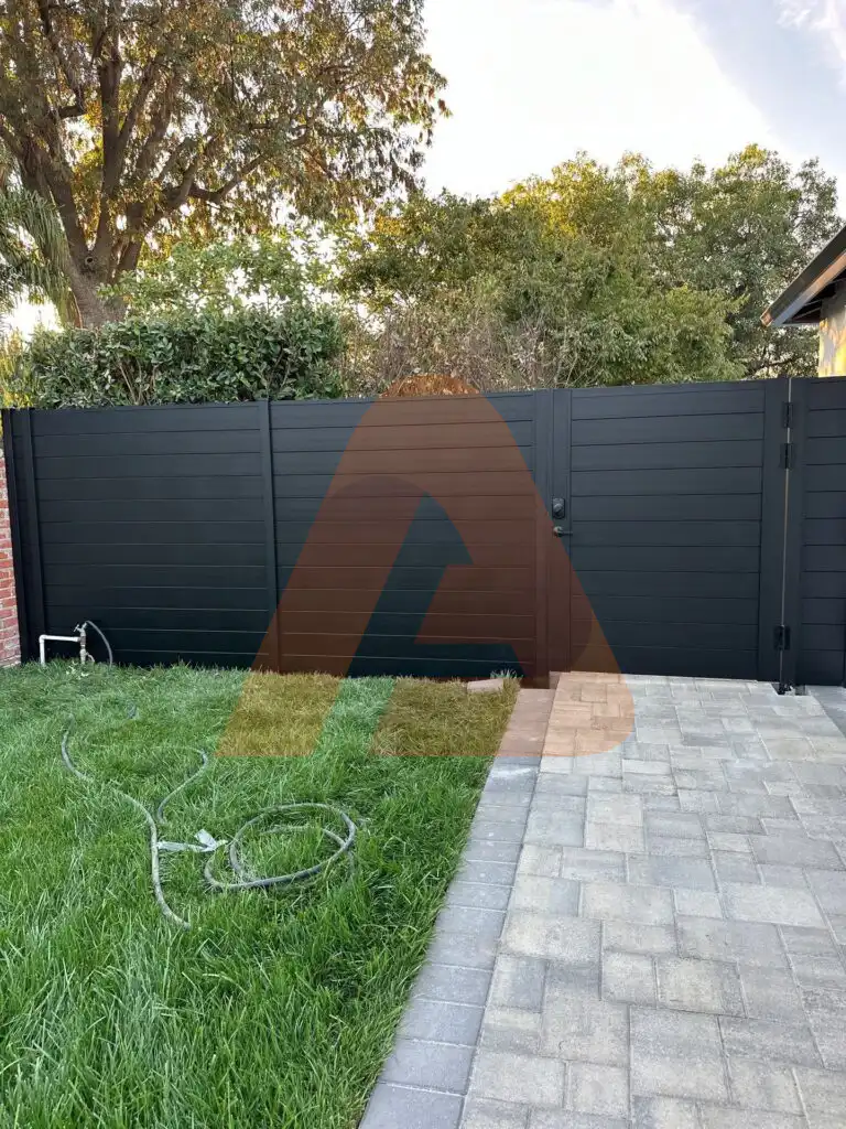 ALU 60 T&G black fence installed by Aluglobus Aluminum Systems