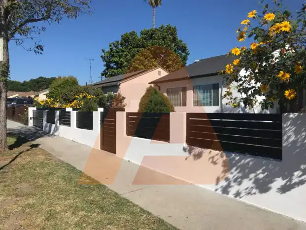 ALU 40 black slat fence installed by Aluglobus Aluminum Systems