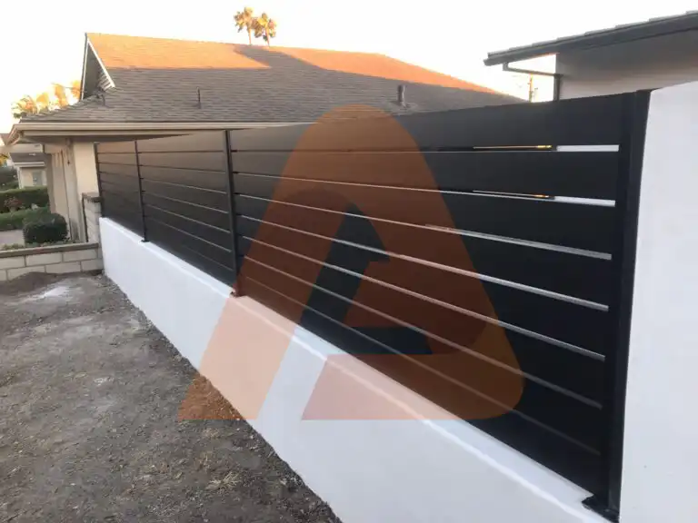 ALU 40 black slat fence installed by Aluglobus Aluminum Systems