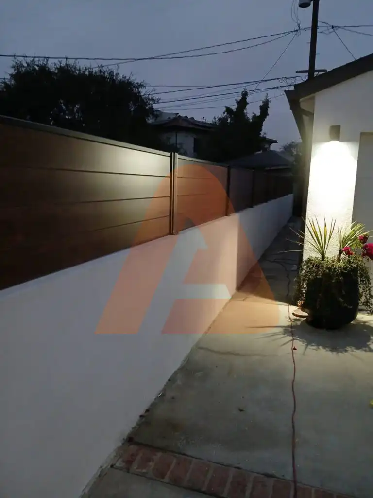 ALU 60 T&G wood grain fence installed by Aluglobus Aluminum Systems