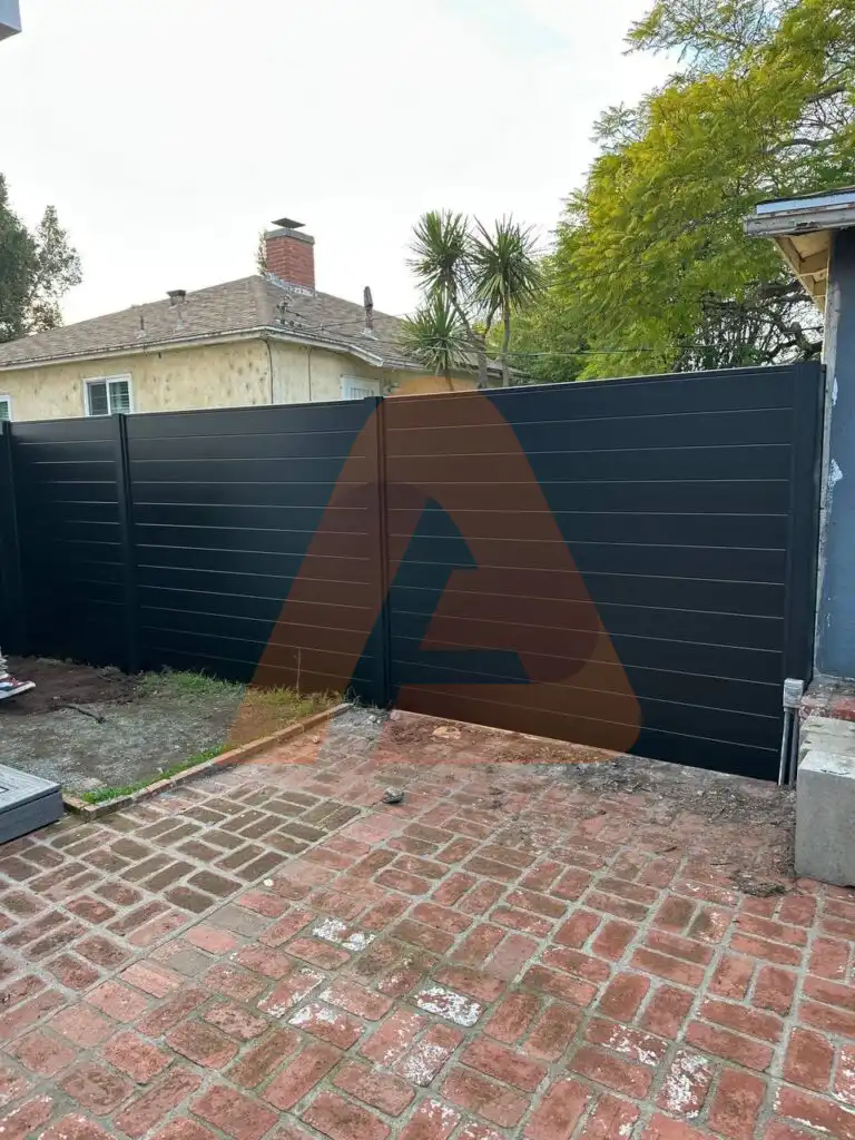 ALU 60 T&G black fence installed by Aluglobus Aluminum Systems