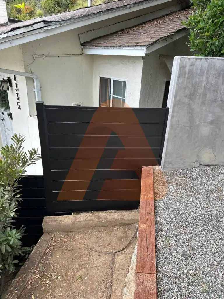 ALU 60 T&G black fence installed by Aluglobus Aluminum Systems