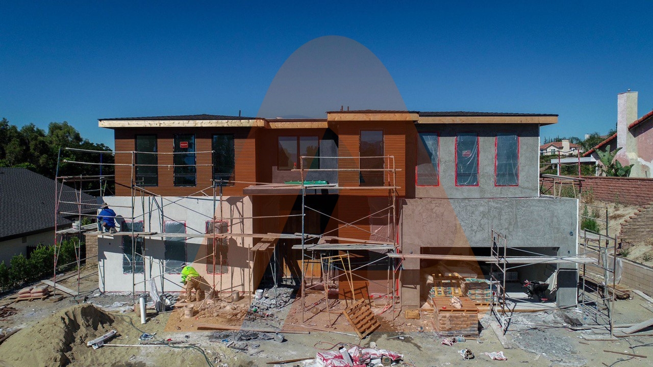 Wall cladding installation process in progress