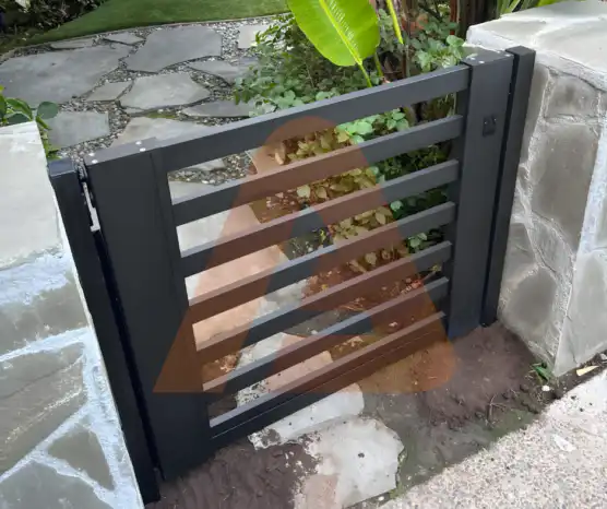 ALU 20 black slat pedestrian gate installed by Aluglobus Aluminum Systems