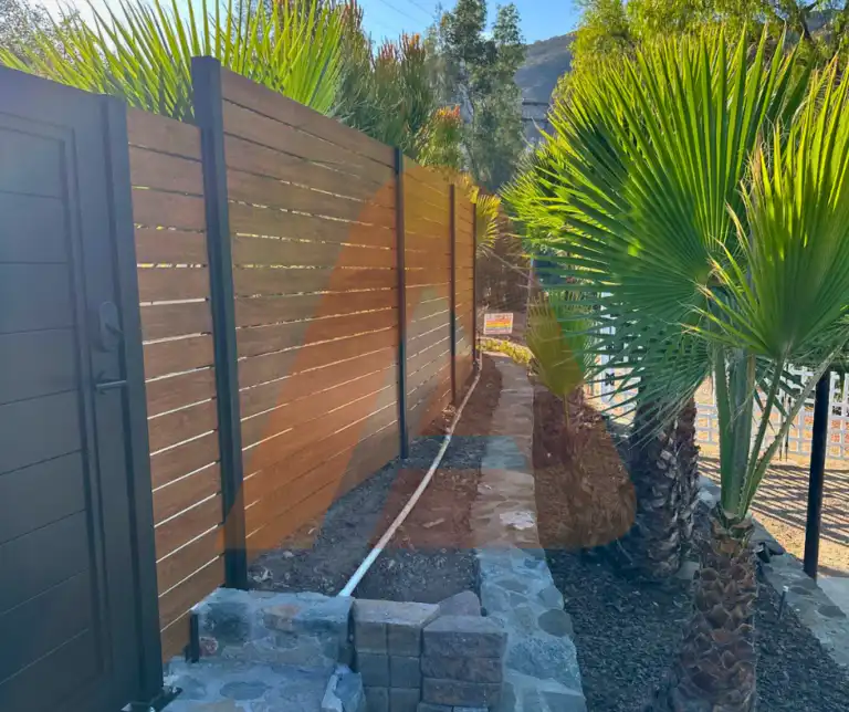 ALU 40 wood grain slat fence installed by Aluglobus Aluminum Systems