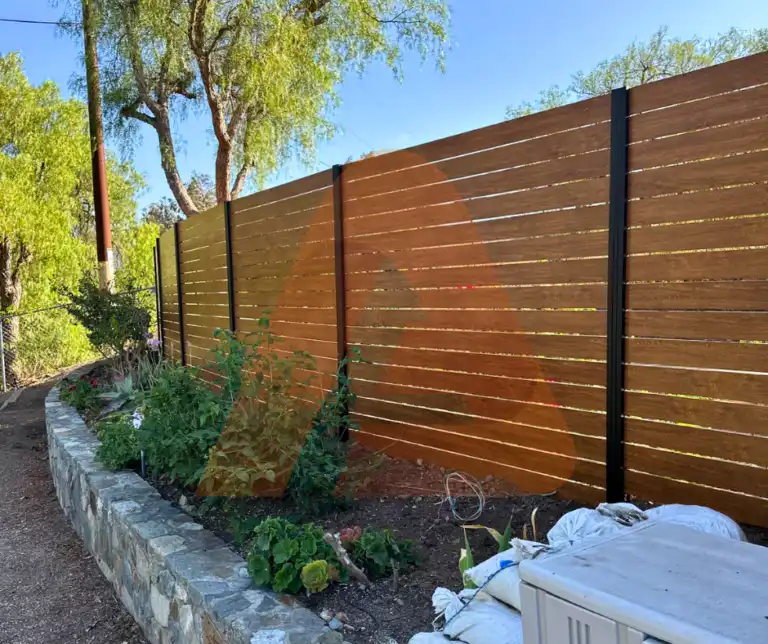 ALU 40 wood grain slat fence installed by Aluglobus Aluminum Systems