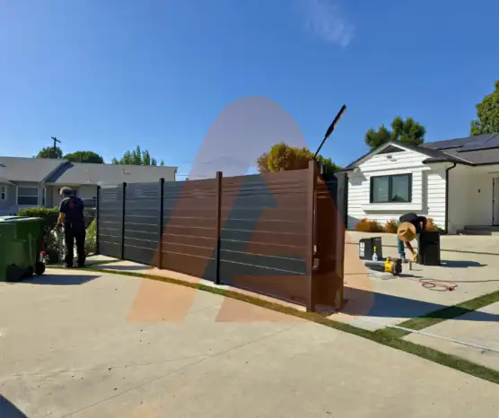 ALU 60 T&G black fence installed by Aluglobus Aluminum Systems