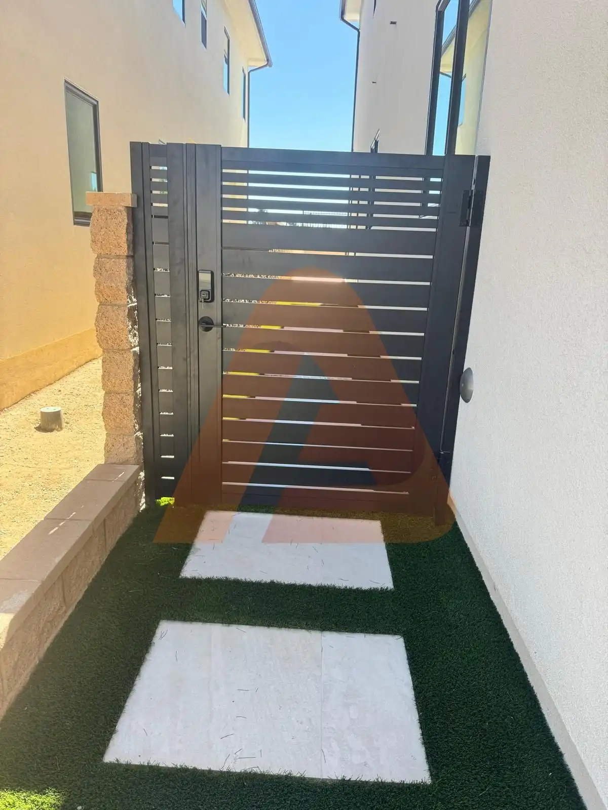 ALU 20 black slat pedestrian gate installed by Aluglobus Aluminum Systems