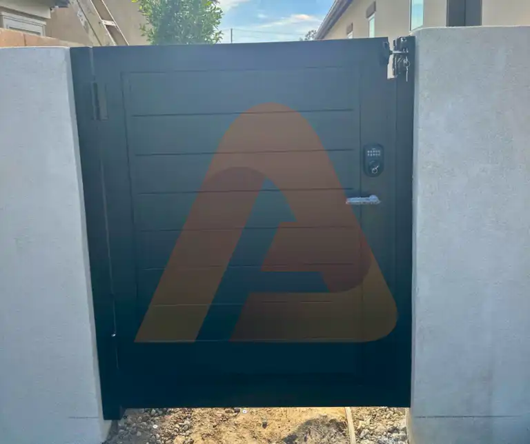 ALU 60 T&G black pedestrian gate installed by Aluglobus Aluminum Systems