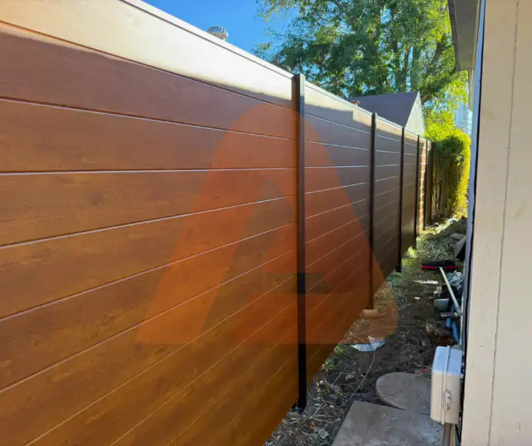 ALU 40 wood grain slat fence installed by Aluglobus Aluminum Systems