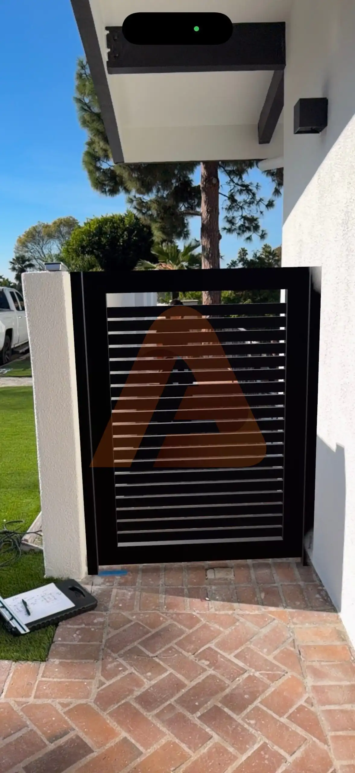 ALU 20 black slat pedestrian gate installed by Aluglobus Aluminum Systems