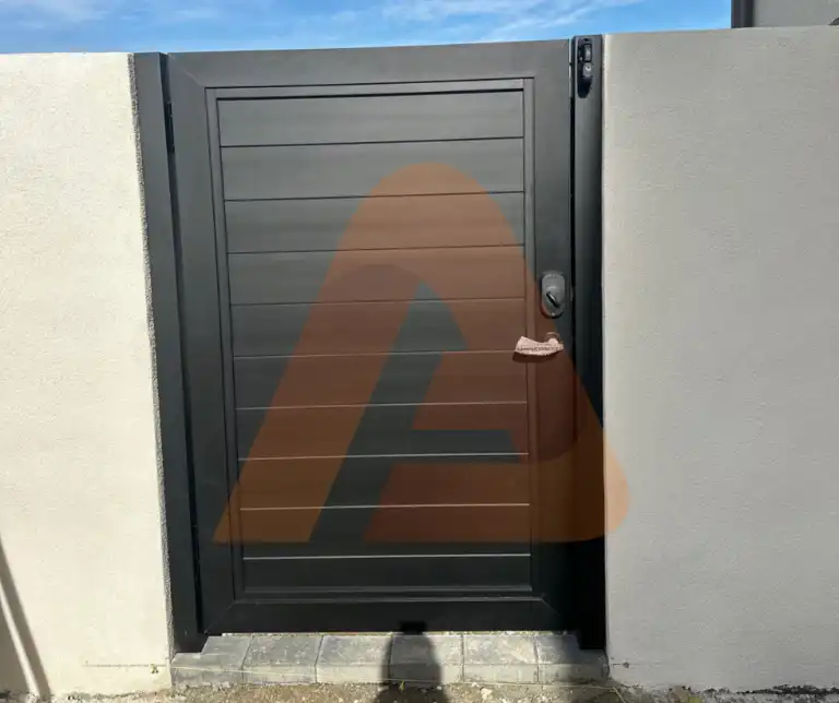 ALU 60 T&G black pedestrian gate installed by Aluglobus Aluminum Systems