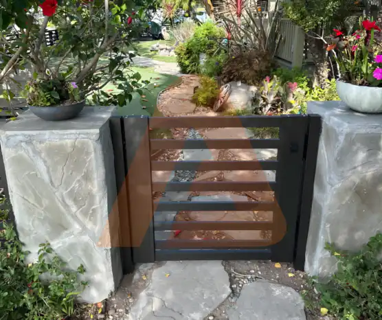 ALU 20 black slat pedestrian gate installed by Aluglobus Aluminum Systems