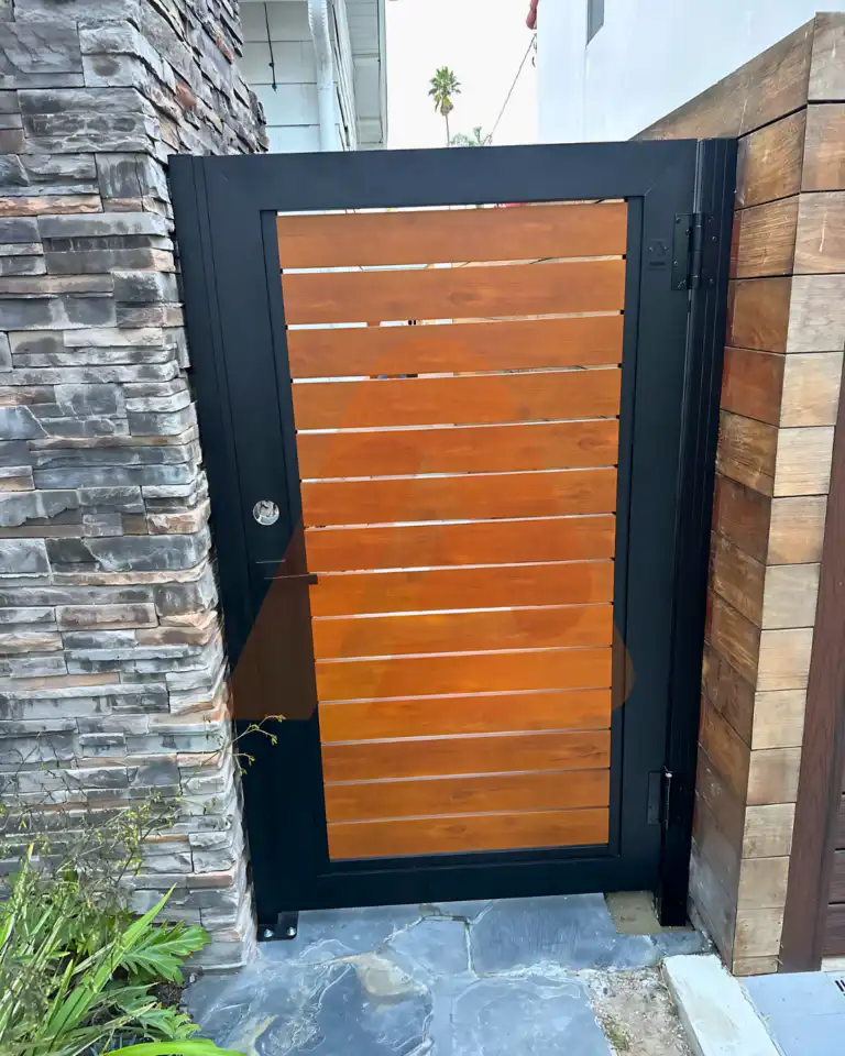 ALU 40 wood grain slat pedestrian gate installed by Aluglobus Aluminum Systems