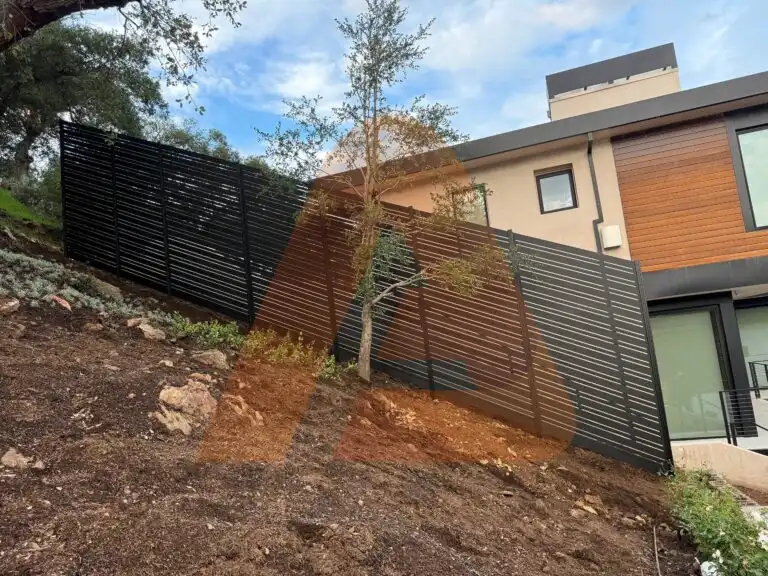 ALU 20 black slat fence installed by Aluglobus Aluminum Systems