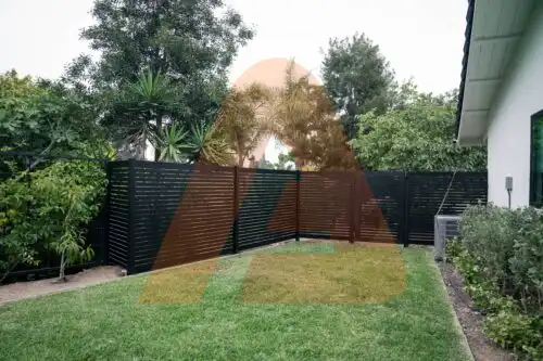 ALU 20 black slat fence installed by Aluglobus Aluminum Systems