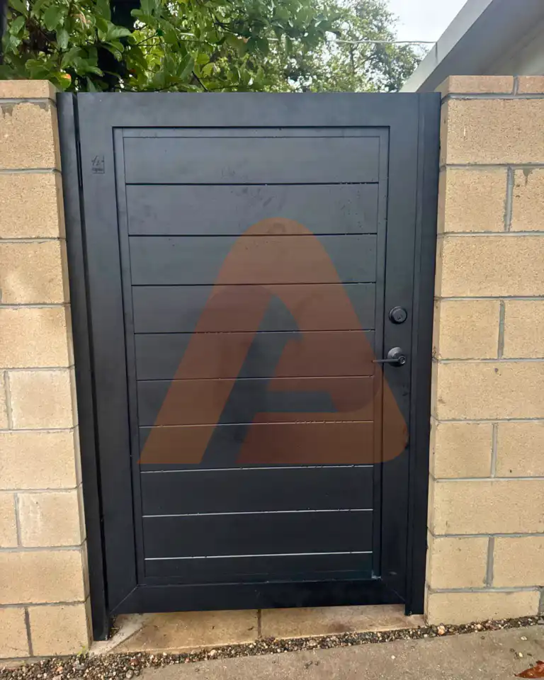 ALU 60 T&G black pedestrian gate installed by Aluglobus Aluminum Systems