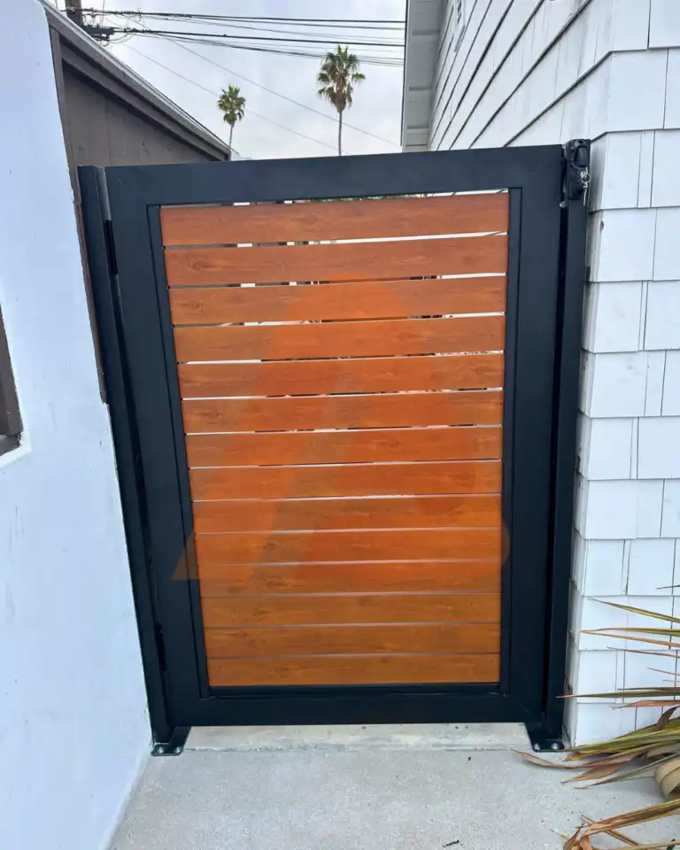 ALU 40 wood grain slat pedestrian gate installed by Aluglobus Aluminum Systems