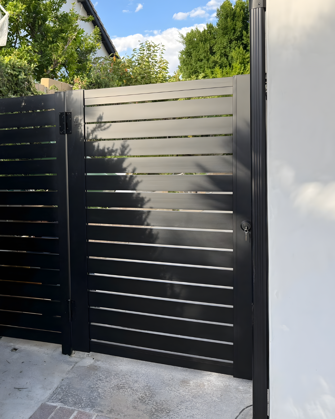 Installed black horizontal slat gate