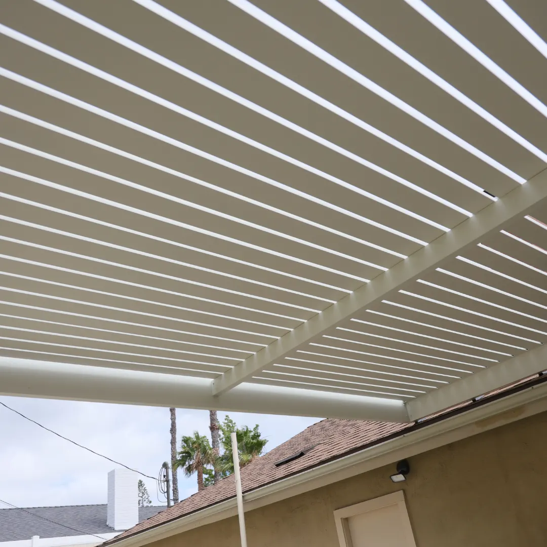 Aluminum slat roof patio cover installed by Aluglobus Aluminum Systems