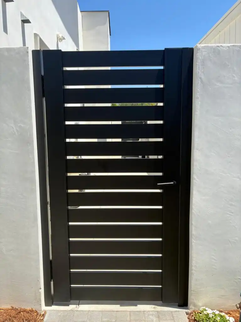 ALU 40 black slat pedestrian gate installed by Aluglobus Aluminum Systems