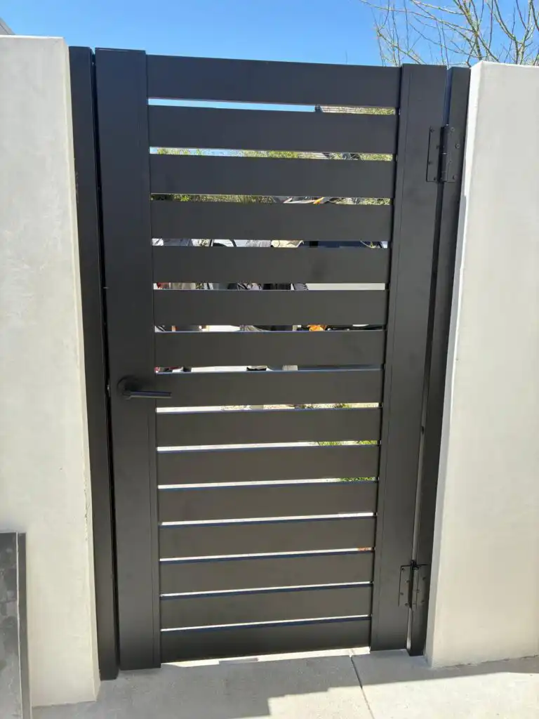 ALU 40 black slat pedestrian gate installed by Aluglobus Aluminum Systems
