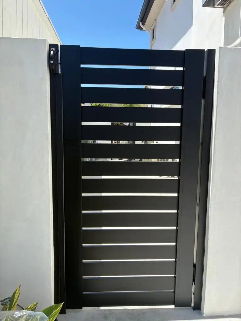 ALU 40 black slat pedestrian gate installed by Aluglobus Aluminum Systems