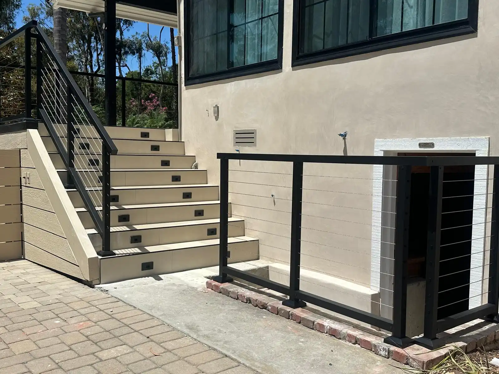 Modern aluminum railing around an elevated exterior area