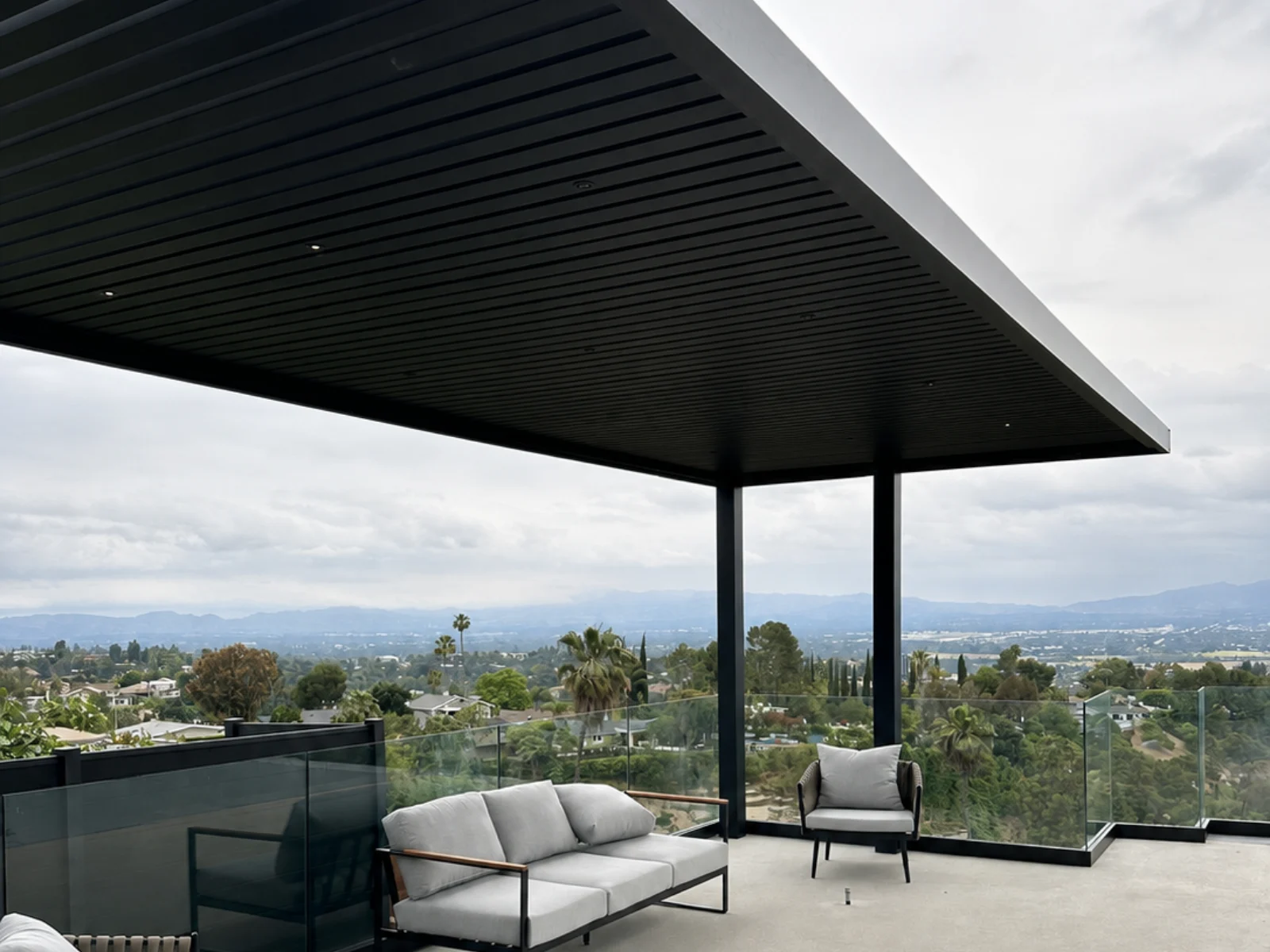 Aluminum slat roof pergola frame and roof-line detail