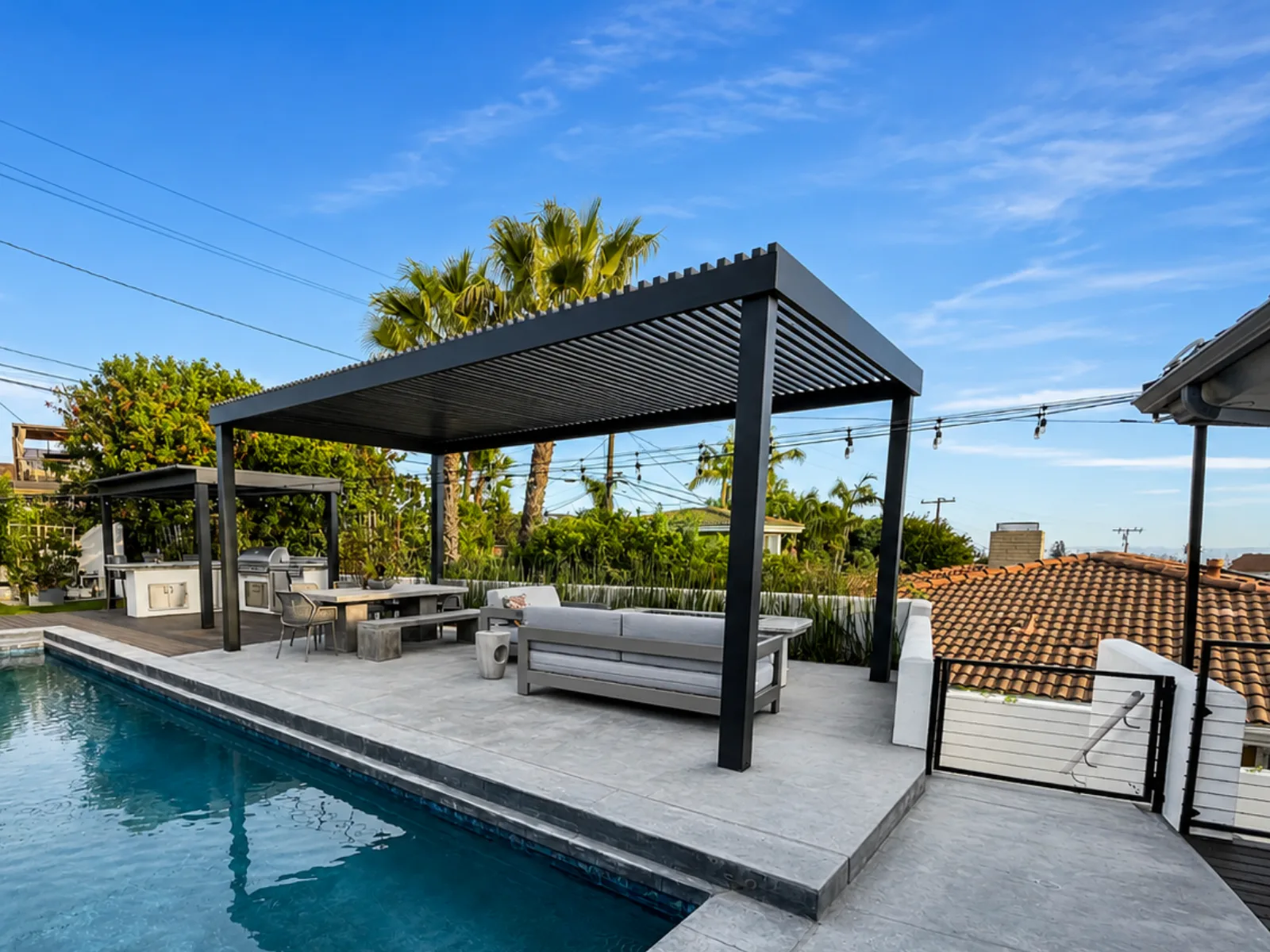 Finished aluminum slat roof pergola with posts and perimeter beams