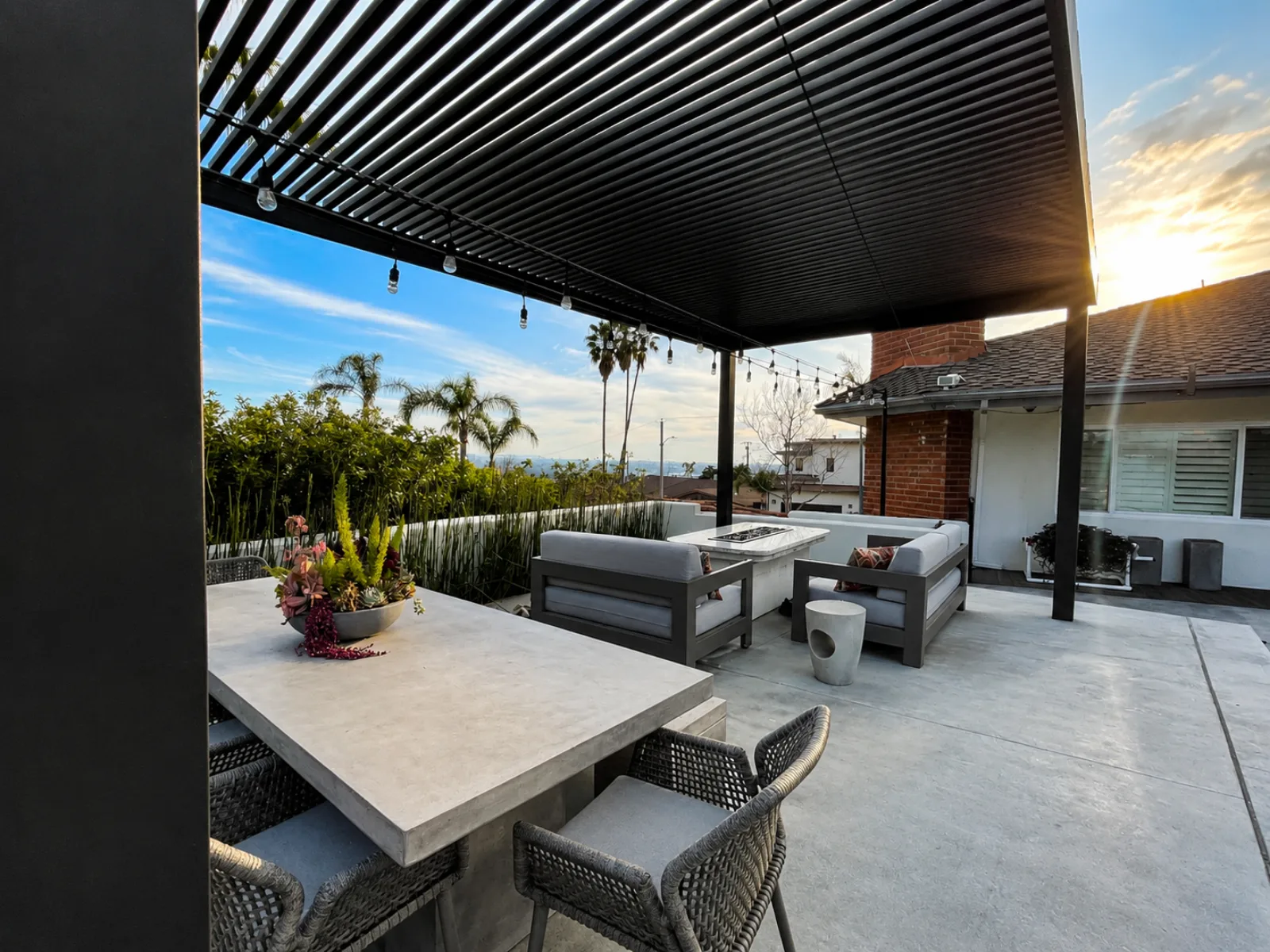 Completed aluminum slat patio cover viewed from the outdoor area
