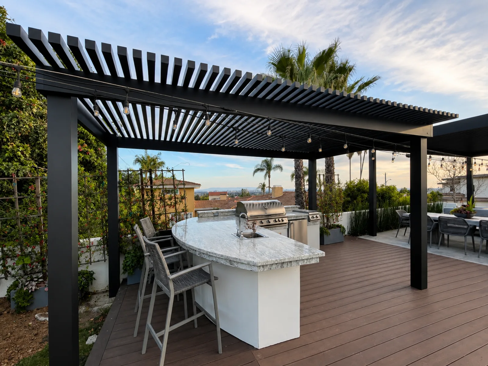 Fixed aluminum roof slats creating filtered shade over a patio