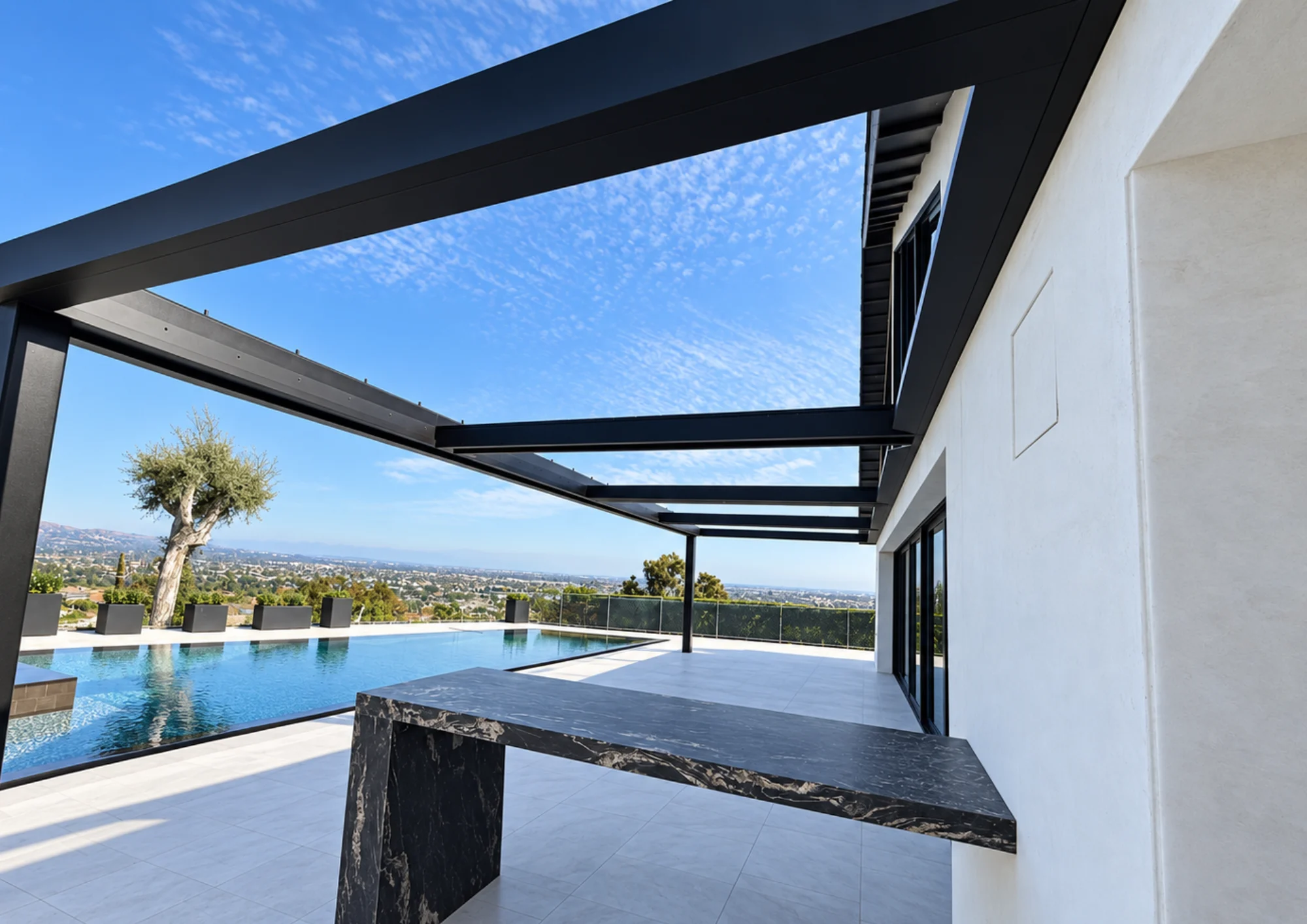 Modern black motorized louvered pergola roof with recessed LED downlights installed above poolside deck