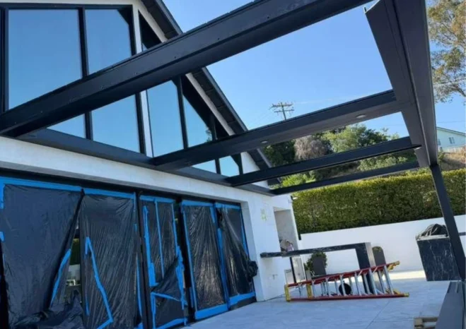 Wall mounted automatic motorized louver patio with integrated LED perimeter strip lighting in Burbank CA