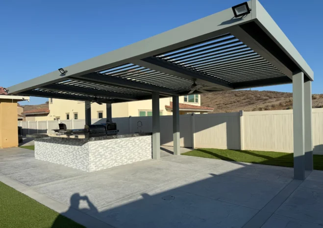 Freestanding cantilevered aluminum louvered pergola system with adjustable roof slats and LED recessed lights