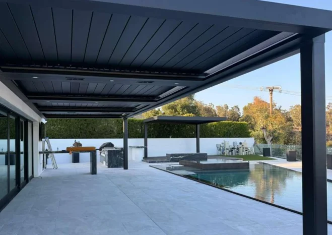 Wall mounted automatic motorized louver patio with integrated LED perimeter strip lighting in Burbank CA