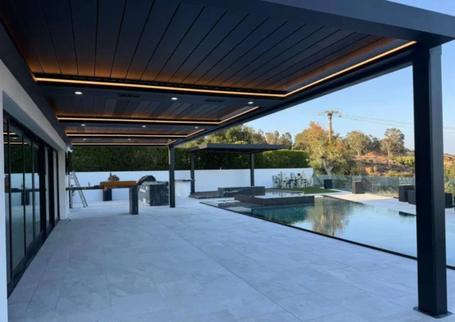 Wall mounted automatic motorized louver patio with integrated LED perimeter strip lighting in Burbank CA