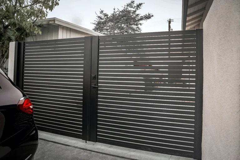 ALU20 black double gate at a driveway side yard