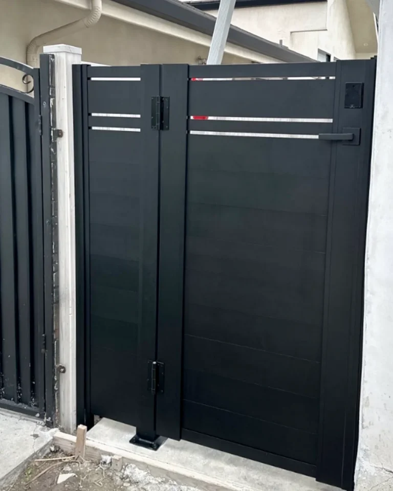 ALU20 black gate and fence on a new build