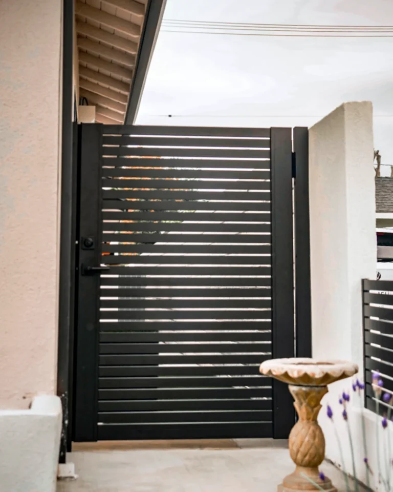 ALU20 black gate in a garden side yard