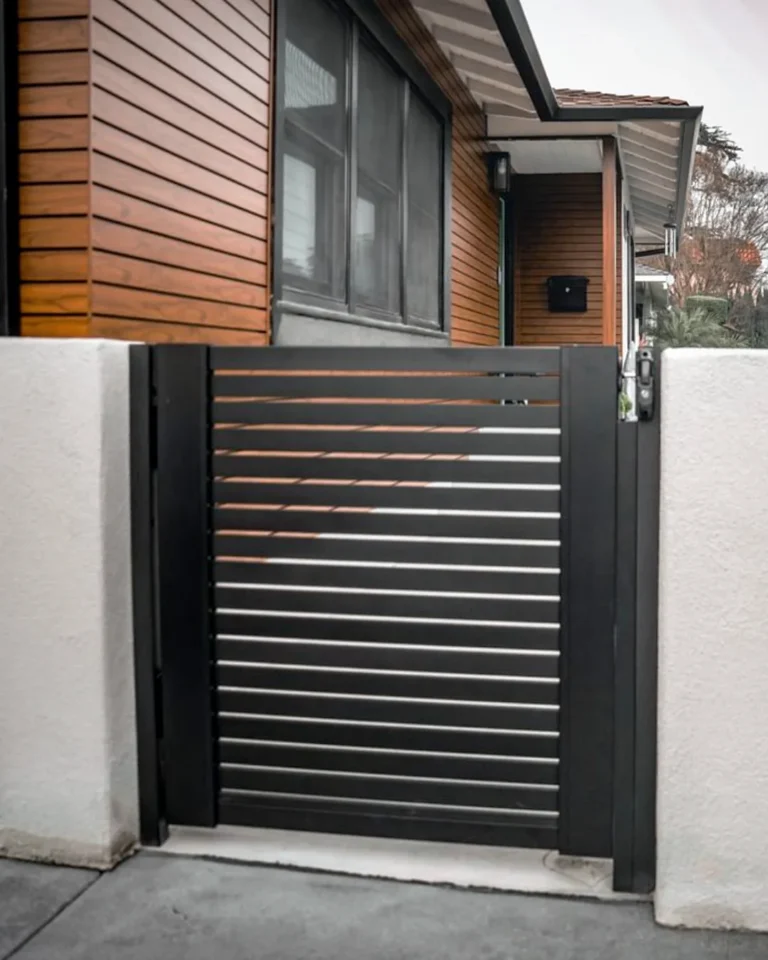 ALU20 black slat gate at a modern home entry