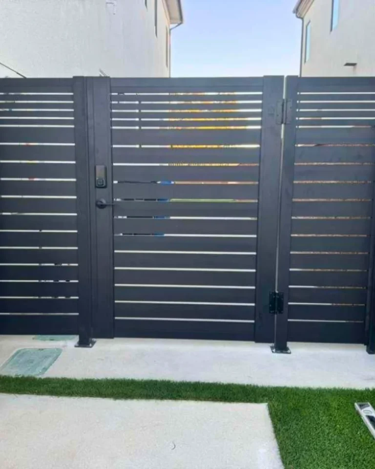 ALU 40 black slat side-yard gate with keypad lock and matching fence panels