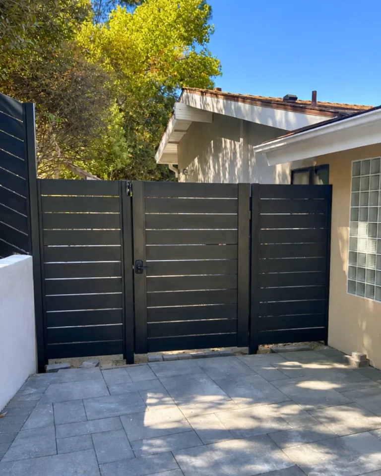ALU 40 black slat gate with two matching side panels at a paver patio
