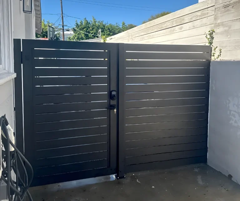 ALU40 black double gate in a side yard