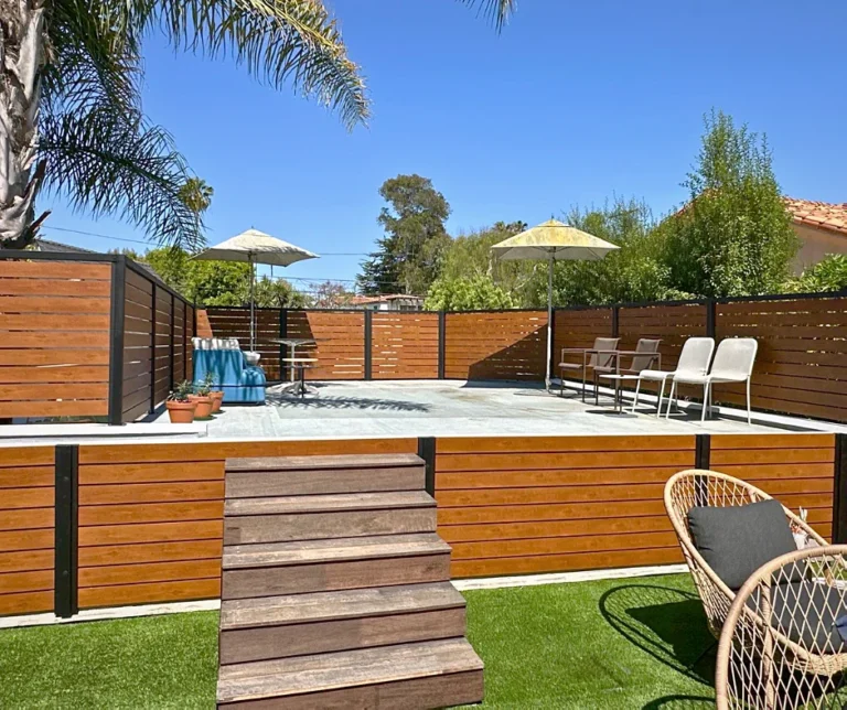 Wood grain ALU40 fence around a pool deck