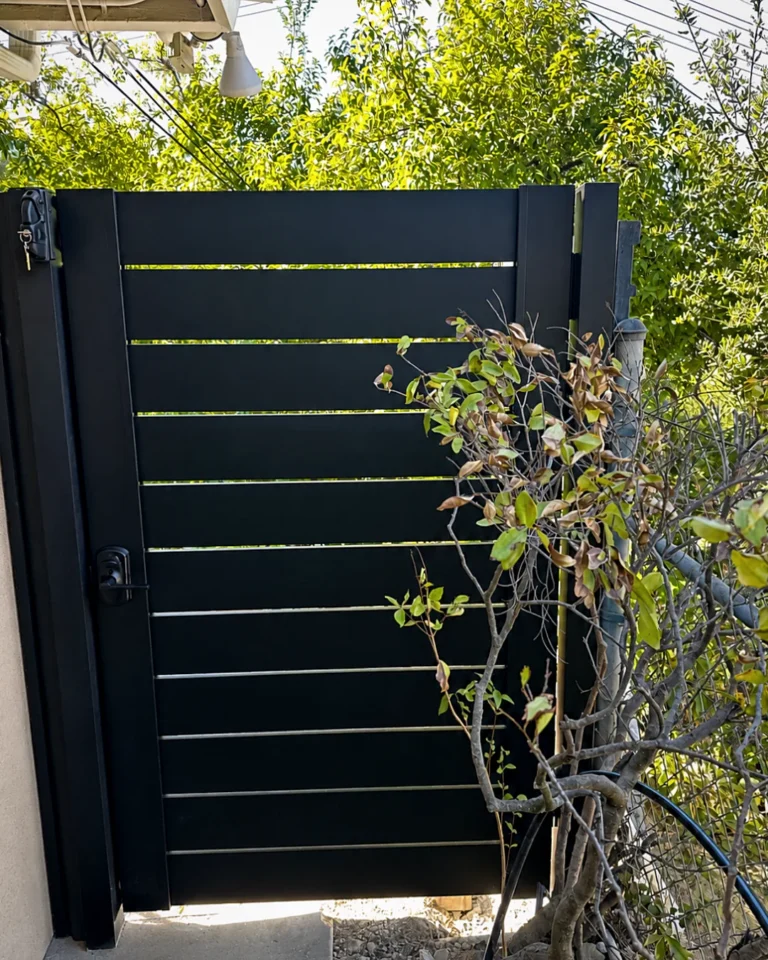 ALU40 black gate on a garden path